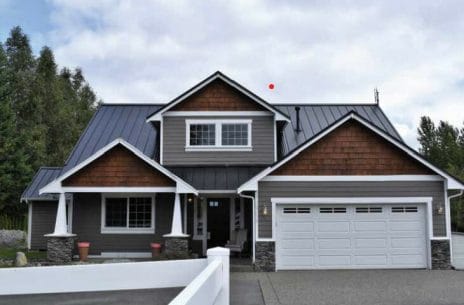 Charcoal Gray Metal Roof With A Pearl Gray Siding 